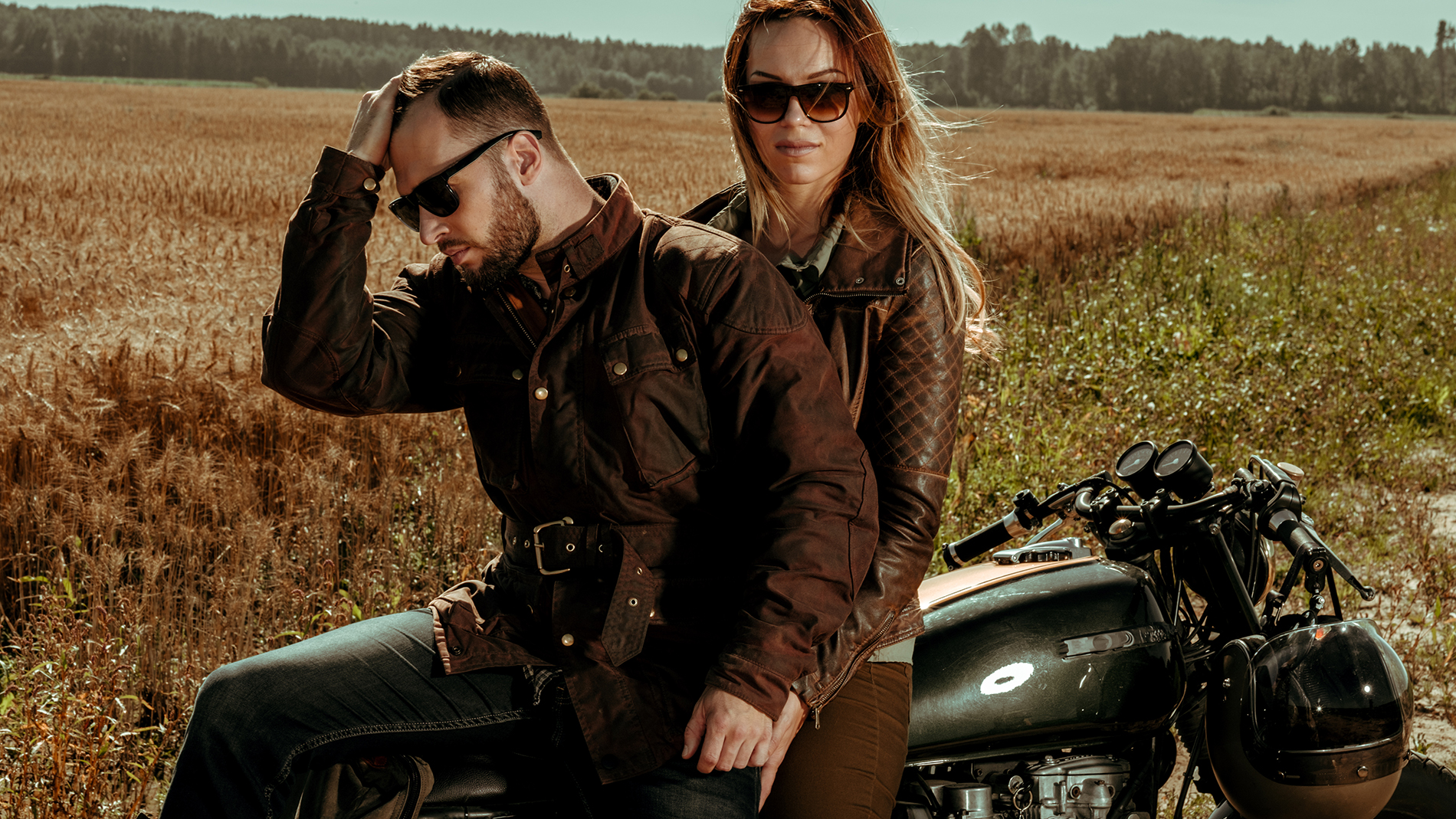 Couple and cafe racer motorcycle