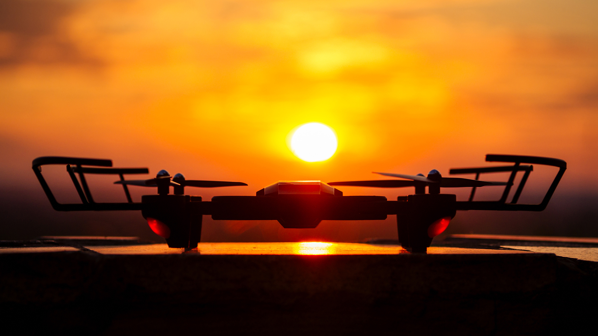 drone drone on a sunset background stands on a table